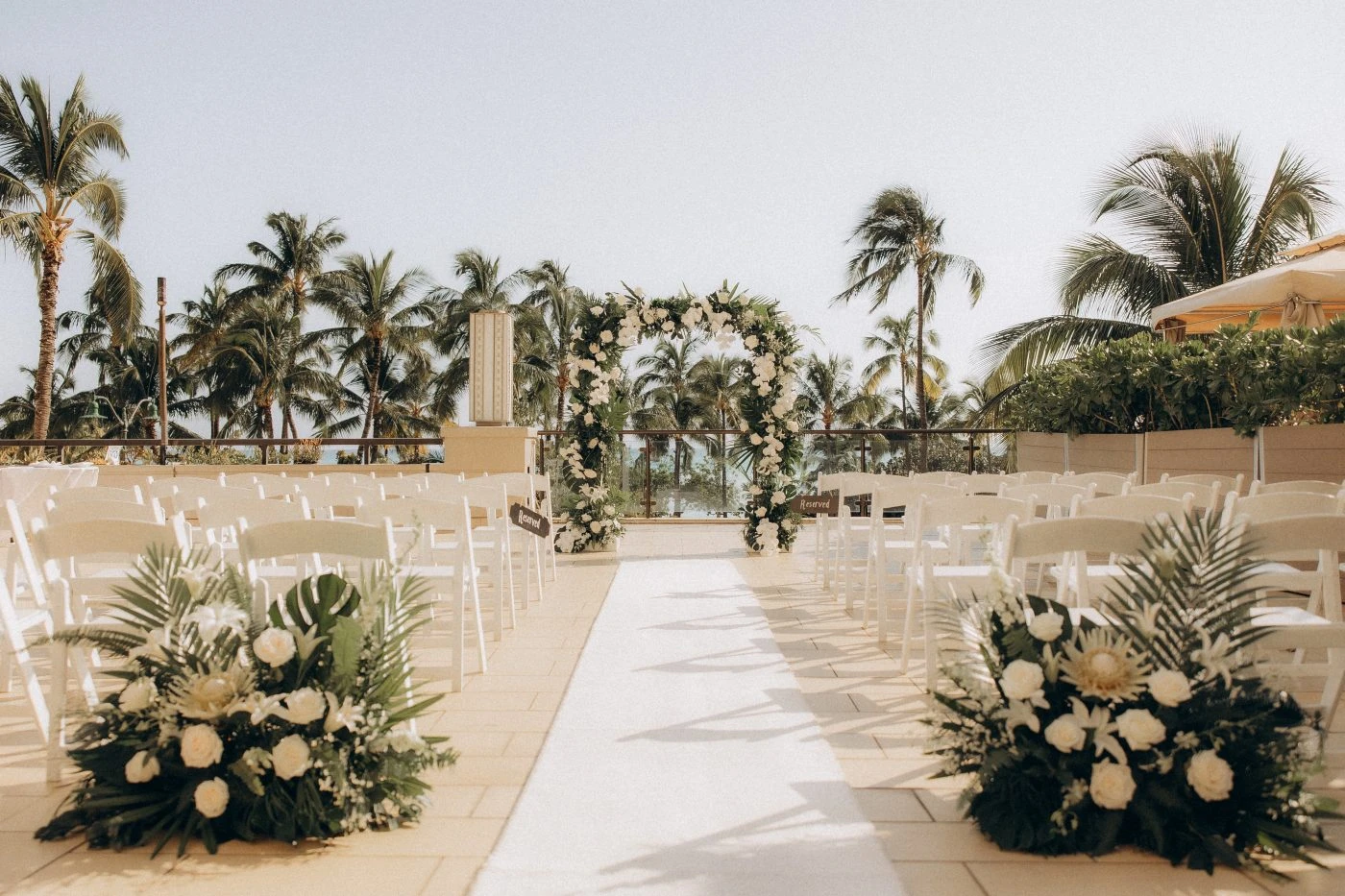 hawaiian wedding ceremony aisle and flower arch