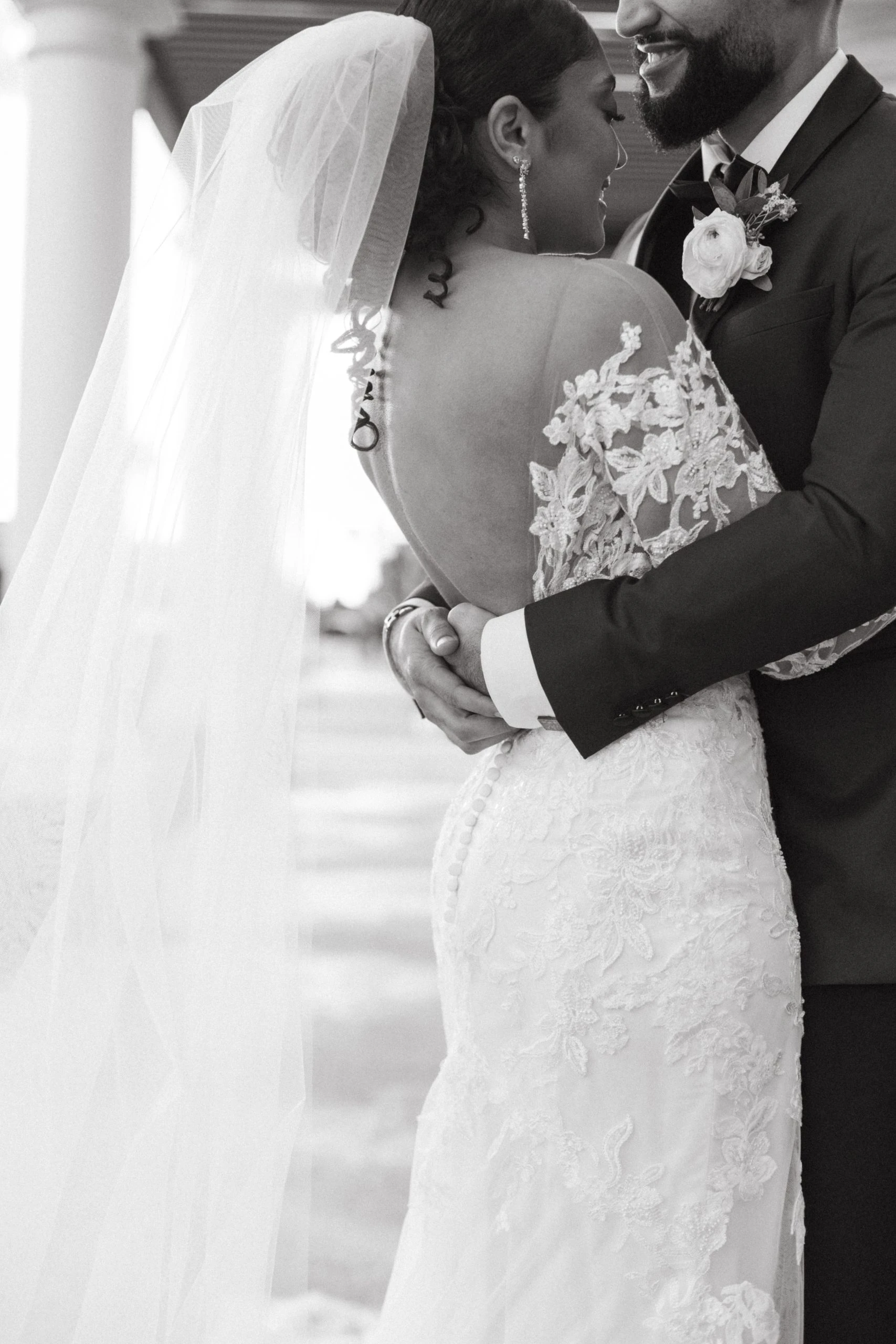 Groom and bride hugging