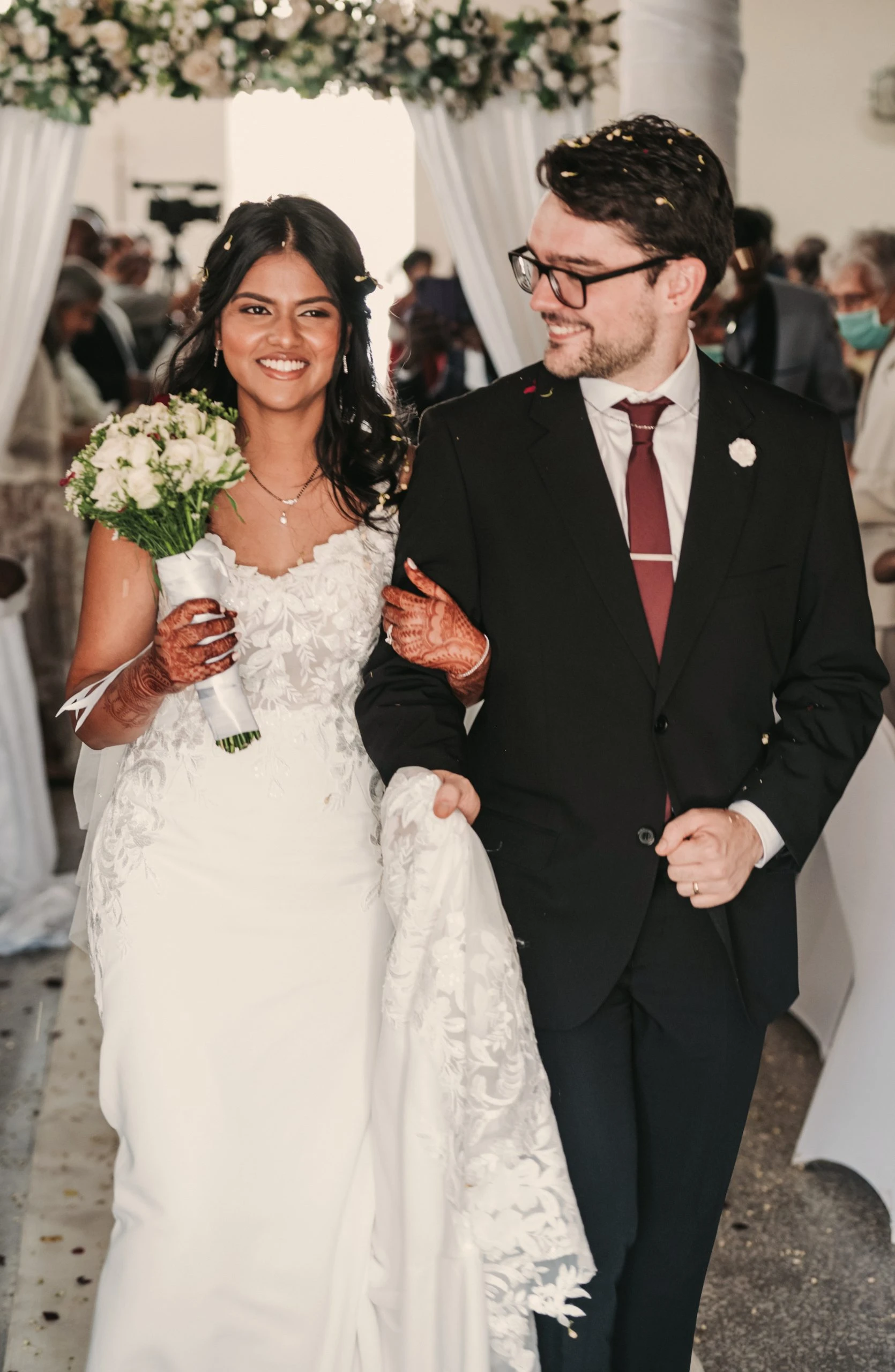 true bride sereena and husband william walking back down the aisle after ceremony - 7715 by Stella York