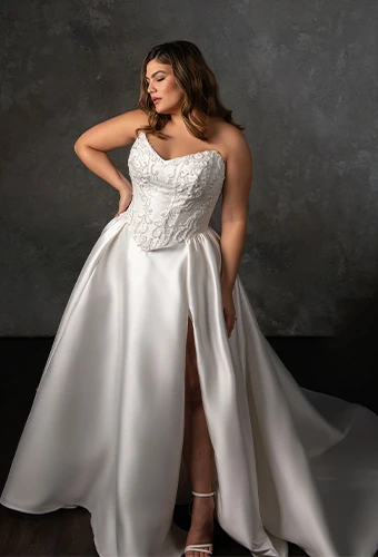 Bride wearing strapless ballgown wedding dress with corset bodice