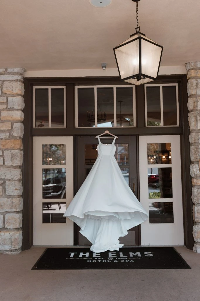 Wedding gown displayed in doorway