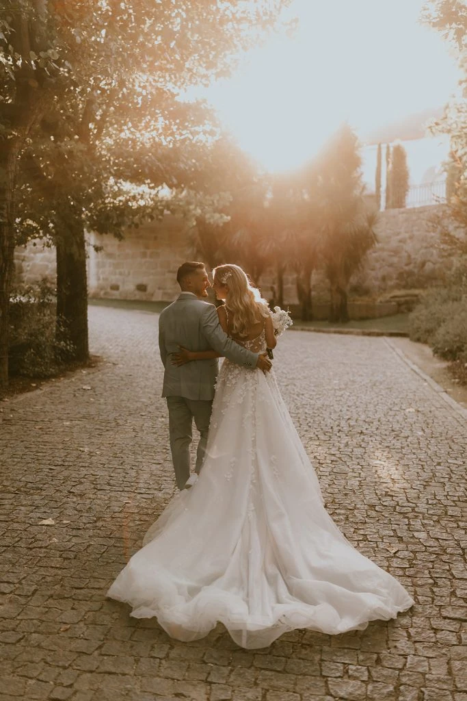 True bride Claudia posing with her husband