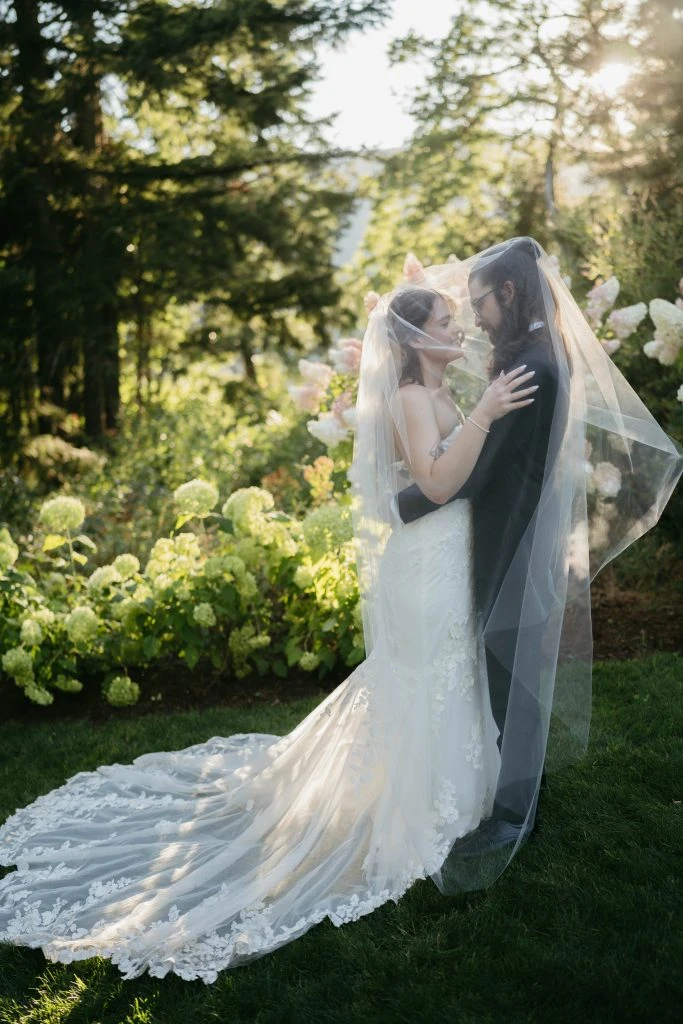 True bride Kate embracing her husband in the forest