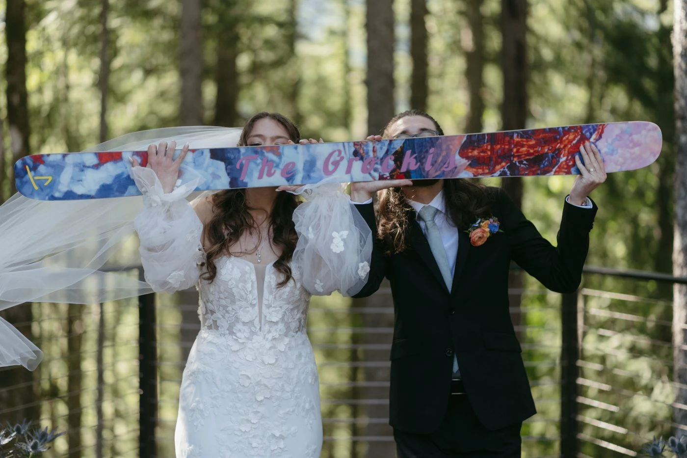 True bride Kate posing with her husband with skis