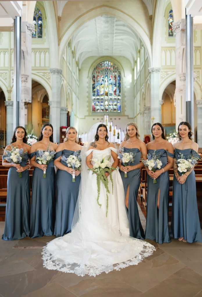 True bride Chloe posing with her bridal party
