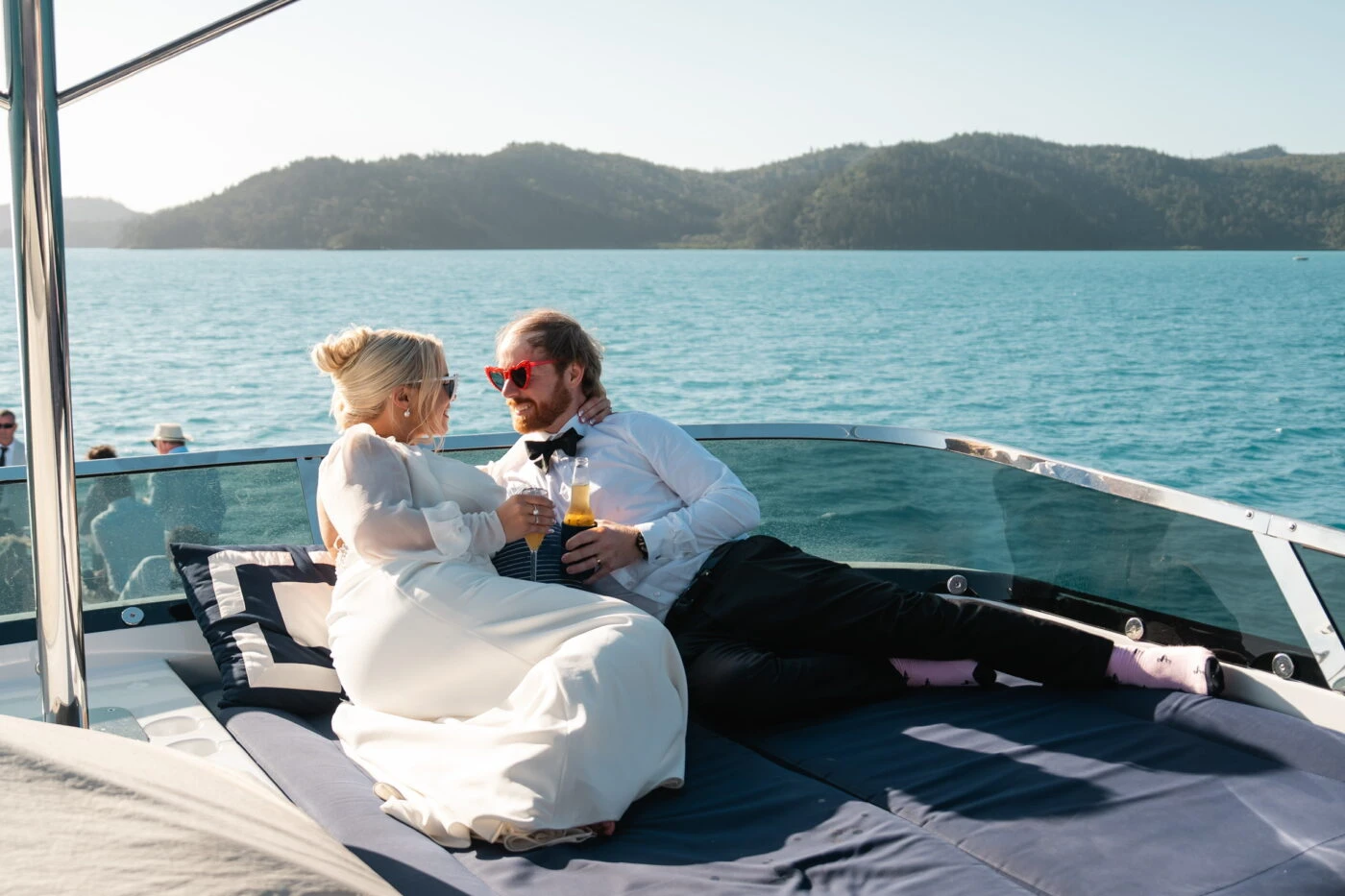 True bride Sophie lounging with her husband on their boat