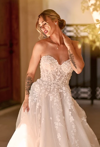 Bride wearing floral lace wedding dress with sweetheart neckline