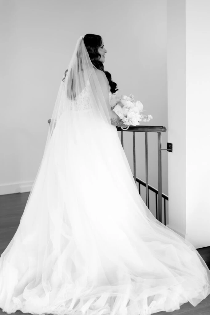 True bride Stephanie posing in her wedding gown