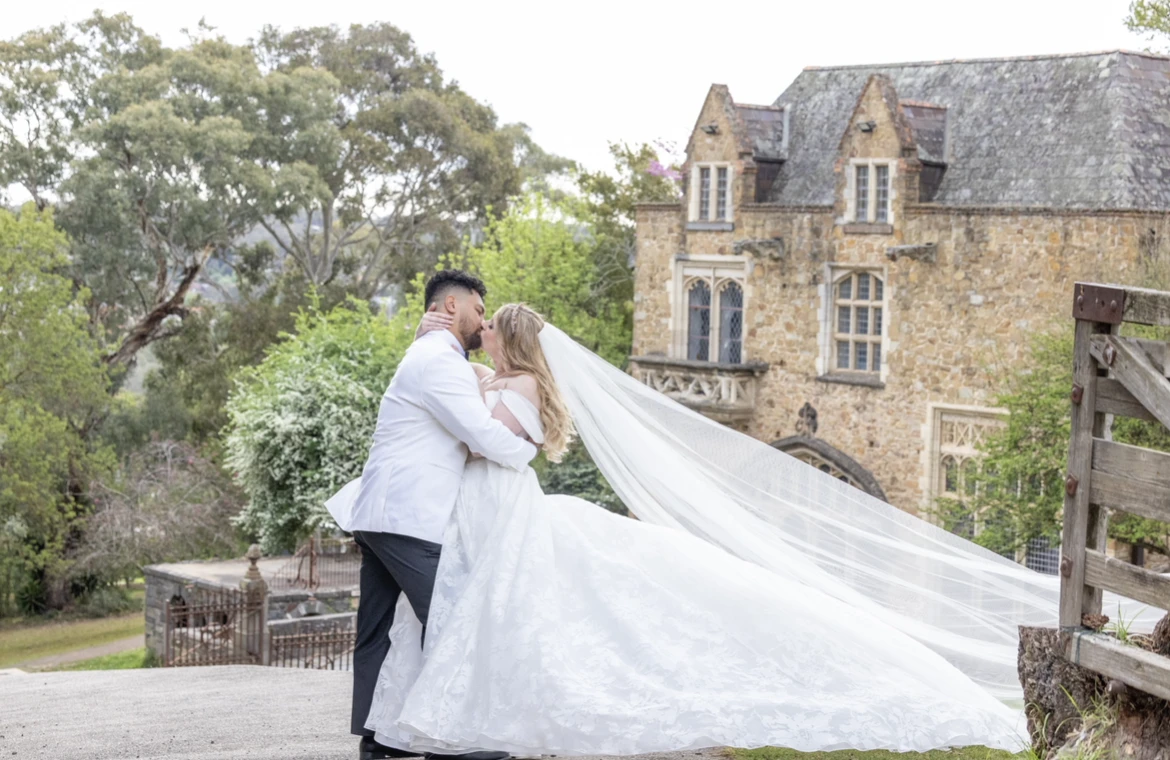 True bride Jaimee posing embracing her husband