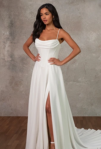 Bride wearing simple a-line wedding dress with high leg slit and cowl neckline