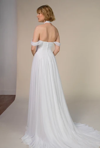 Bride wearing a-line wedding dress with asymmetrical high neckline