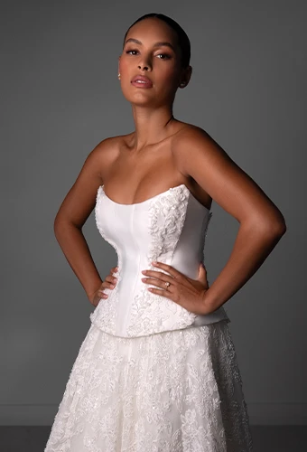 Bride wearing faux two piece wedding dress with lace and strapless neckline