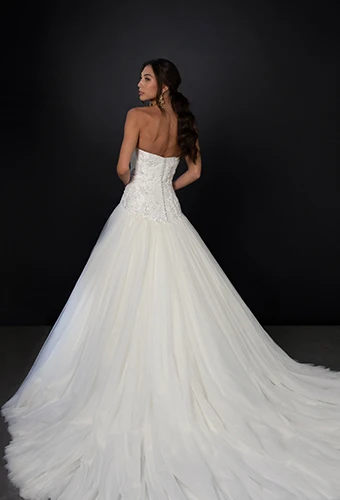 Bride wearing strapless tulle ballgown with sparkling lace bodice