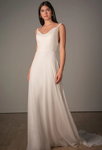 Bride wearing simple wedding dress with v-neckline