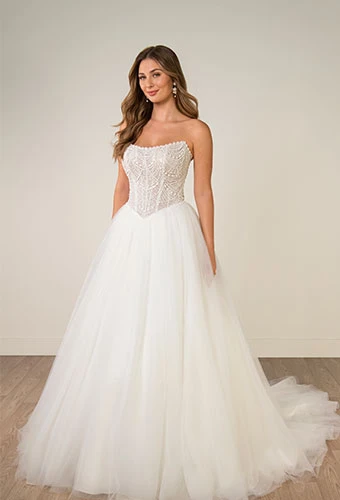 Bride wearing strapless ballgown wedding dress with beaded corset