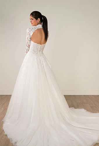 Bride wearing a-line wedding dress with lace long sleeves