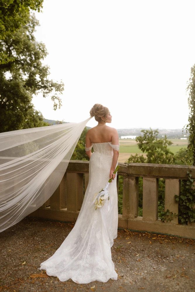 True bride Anduka posing in her wedding gown
