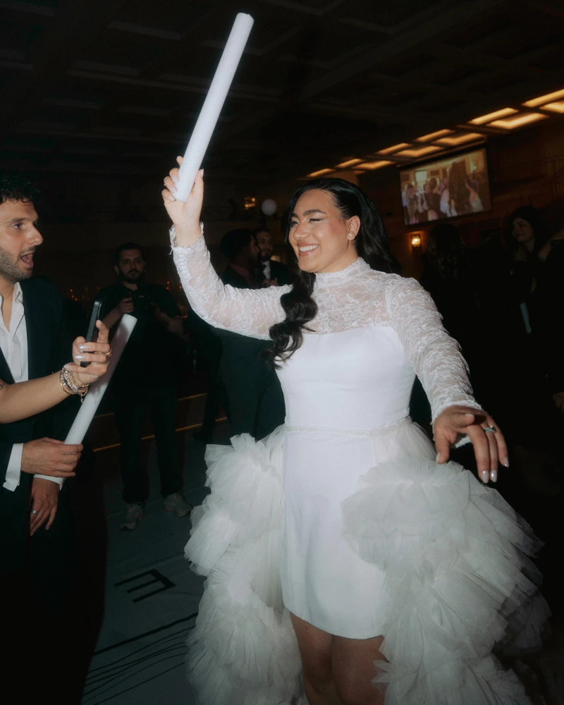 True bride Zübeyde celebrating at her wedding reception