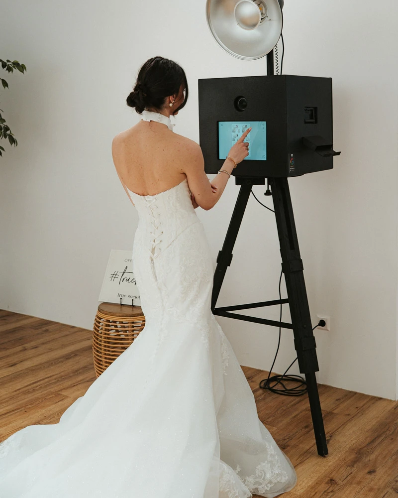 Bride using fotobox