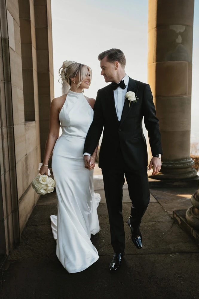 True bride Lea posing with her husband