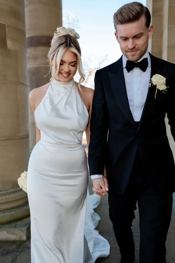 True bride Lea posing with her husband
