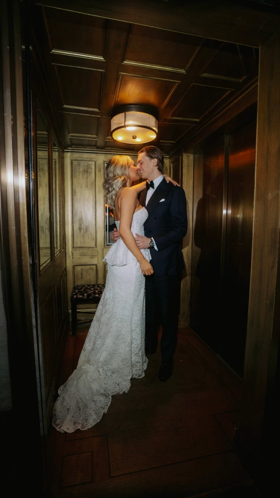 True bride Sarah embracing her husband