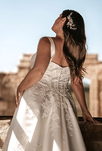 Plus size bride wearing jacquard a-line wedding dress with straps
