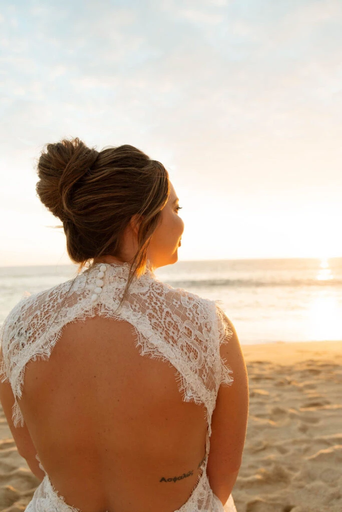 True Bride Nathalia showing off the back of her wedding dress