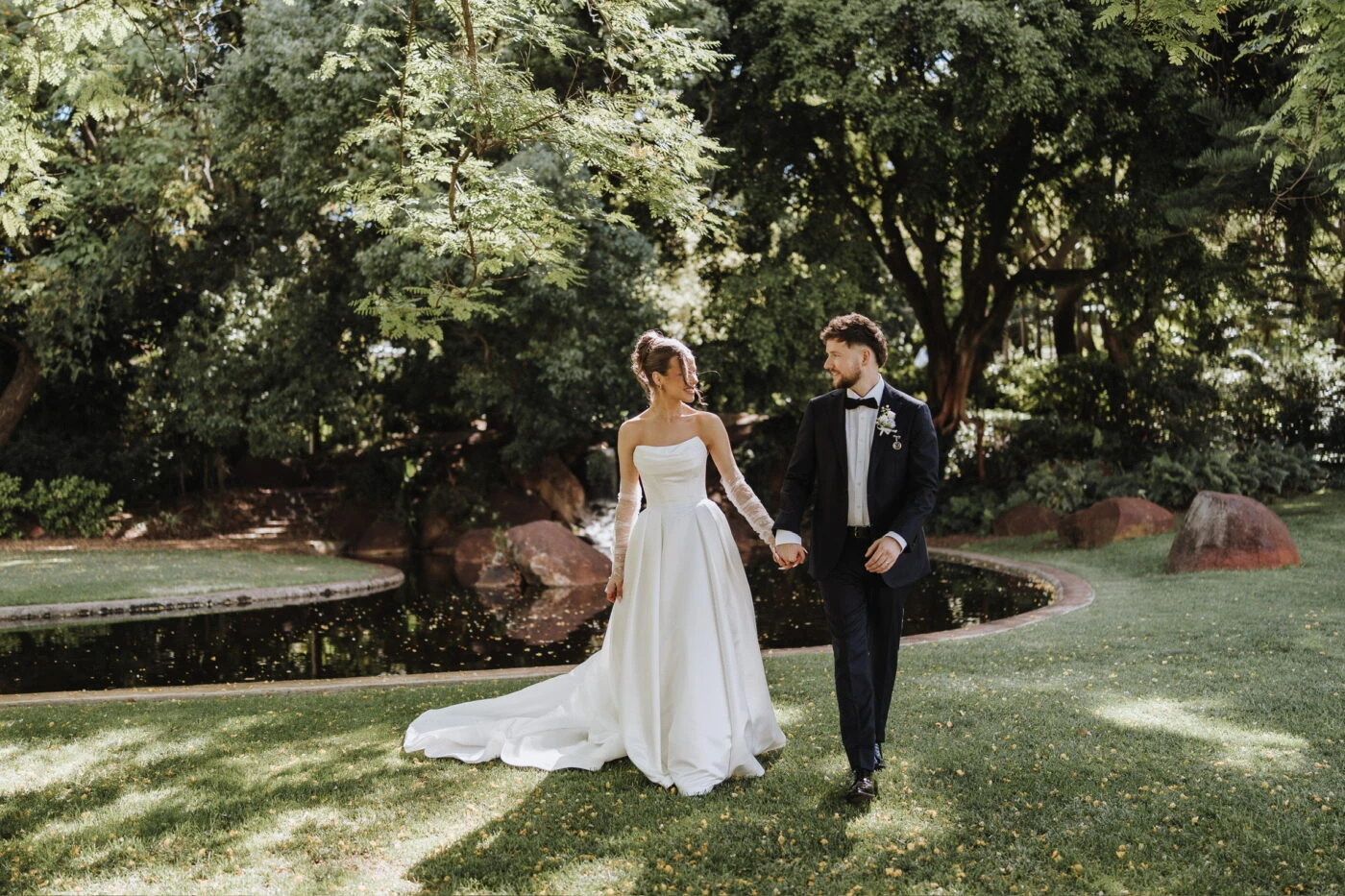True Bride Tenille and Nick holding each others hand