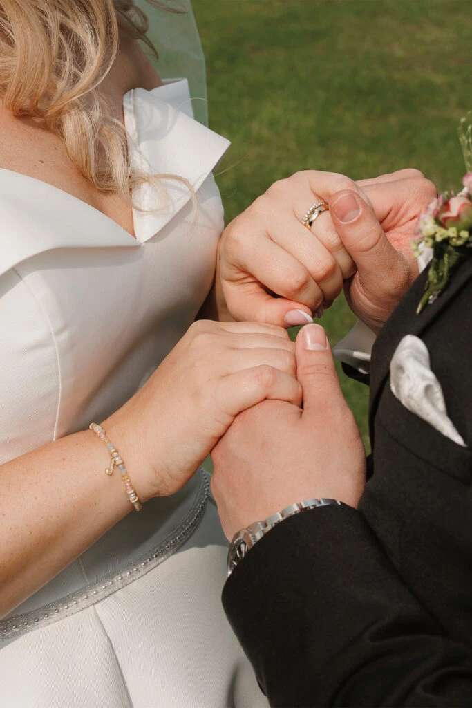 True Bride Janine and Andre holding each others hand