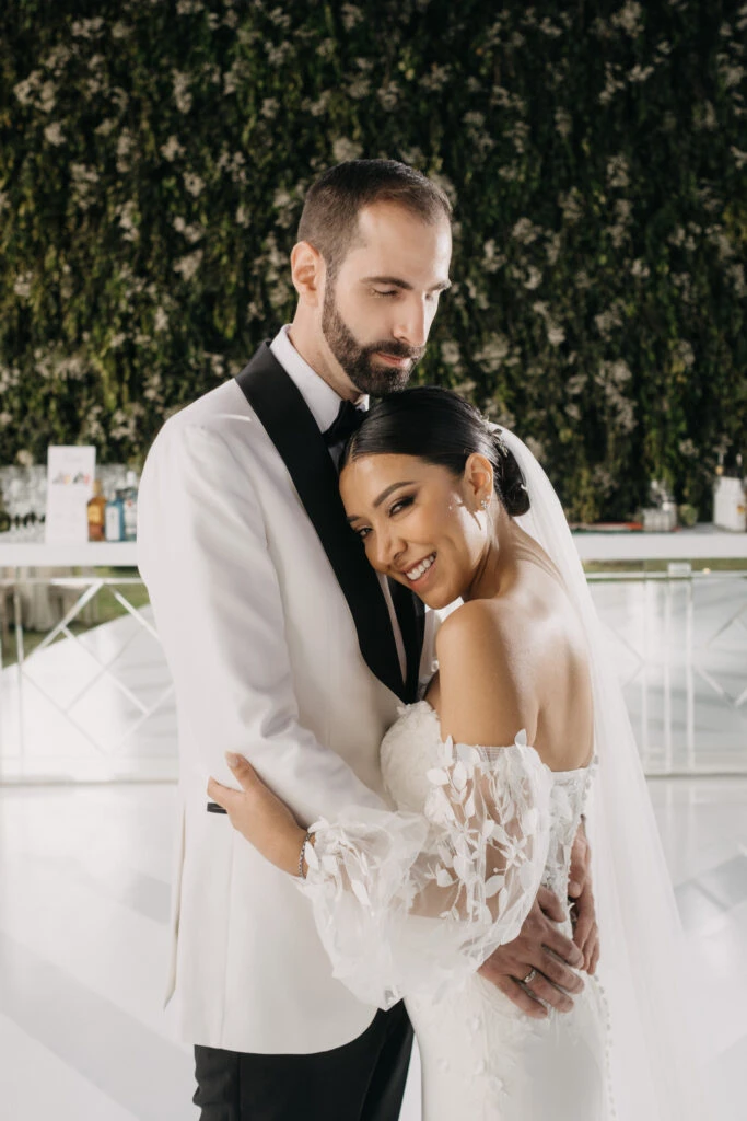 True Bride Mayra and Marco embracing each other