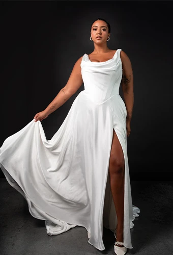 Plus size bride wearing charmeuse a-line wedding dress with cowl neck