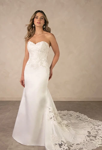 Bride wearing strapless wedding dress with lace bodice and sweetheart neckline