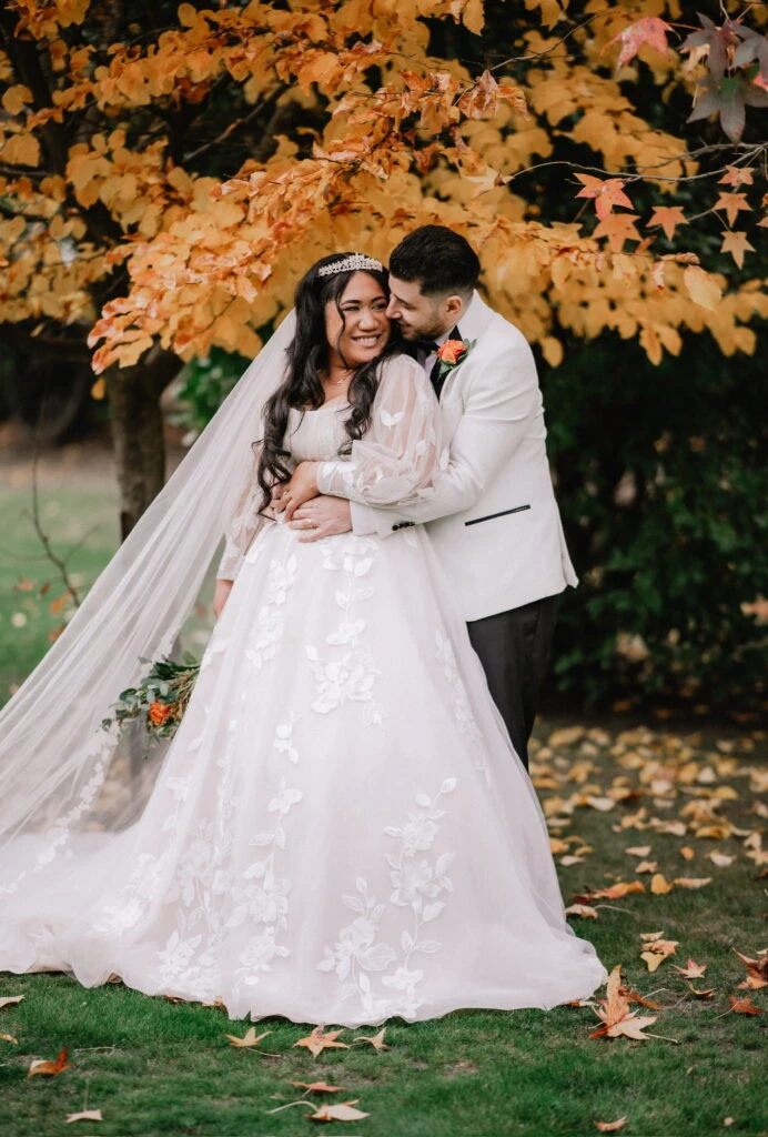 True bride Kuini posing with her husband