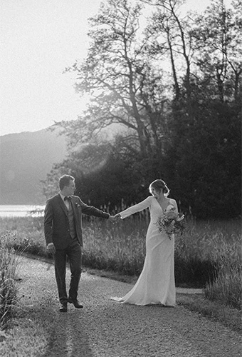Bride Lea posing with her husband