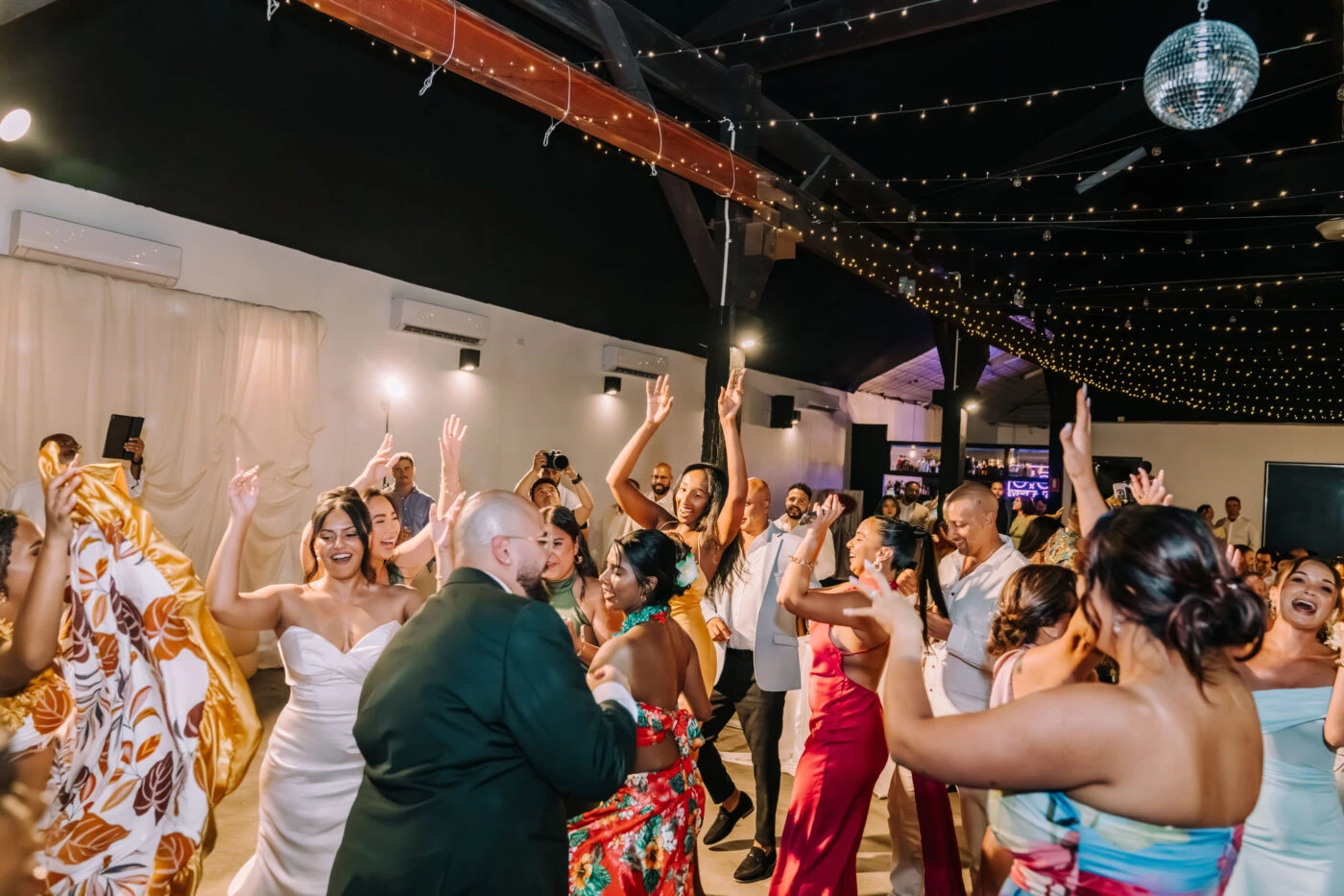 True Bride Kayla and Reece dancing with their wedding guests at their reception