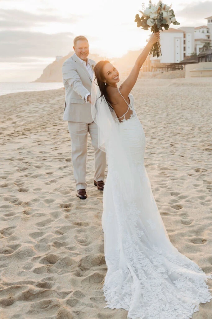 True Bride April and Aaron smiling together on the beach