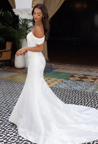 Bride wearing Essense of Australia style D4493, a fit-and-flare wedding dress in matte lace and mikado