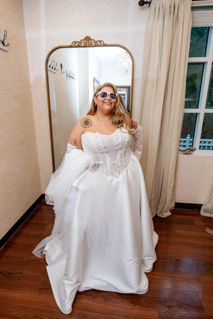 True bride Cecillia posing in her wedding gown