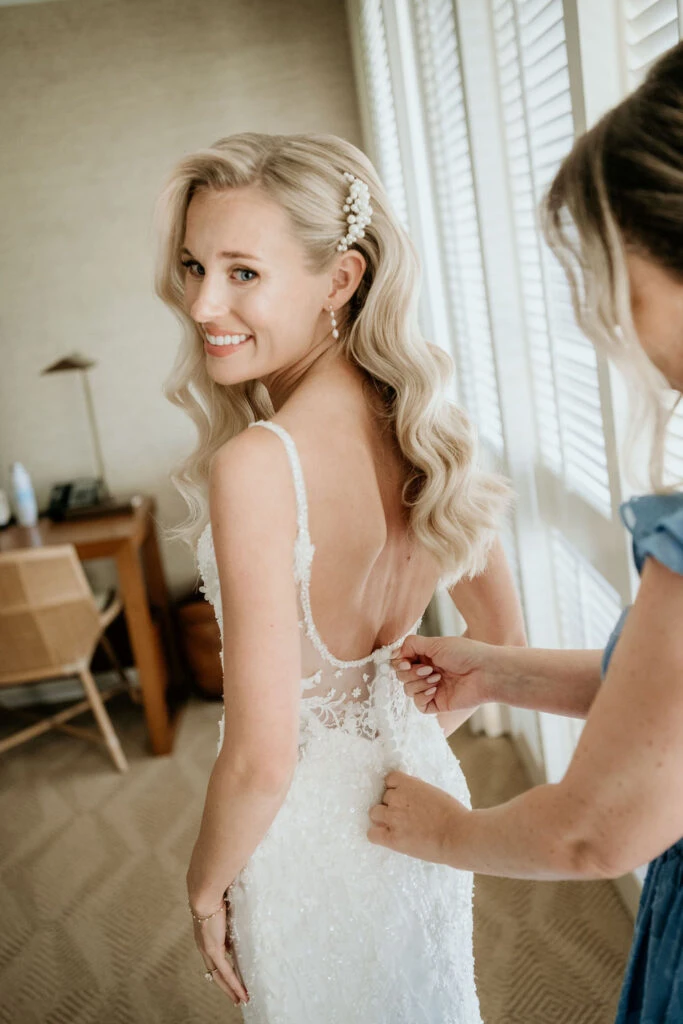 True bride Erin posing in her wedding gown