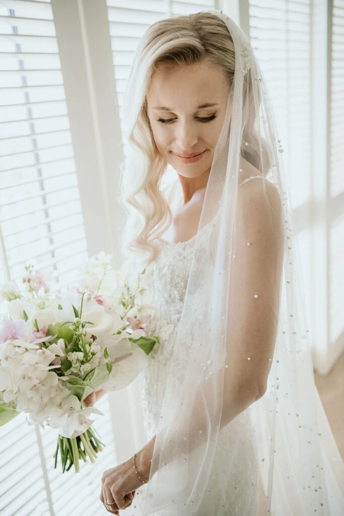 True bride Erin posing in her wedding gown
