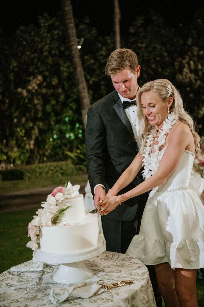 True bride Erin and her husband cutting their cake