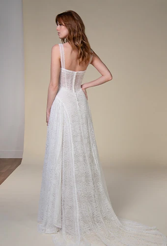 Bride wearing a-line wedding dress with matte lace and straps