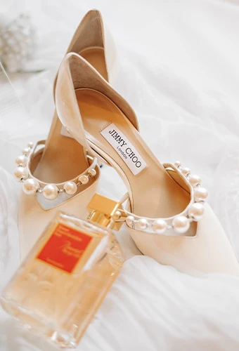 Bridal shoes display with perfume