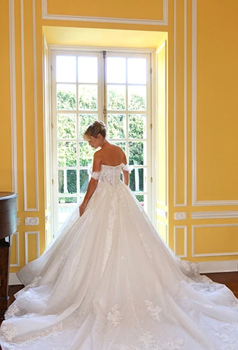 Bride wearing princess ballgown with floral royal train, Martina Liana ml1704