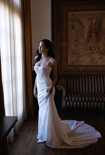 Bride wearing sequin sheath wedding dress with square neckline and chapel train, Essense of Australia d4615