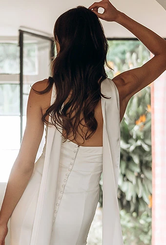 Bride wearing simple strapless wedding gown