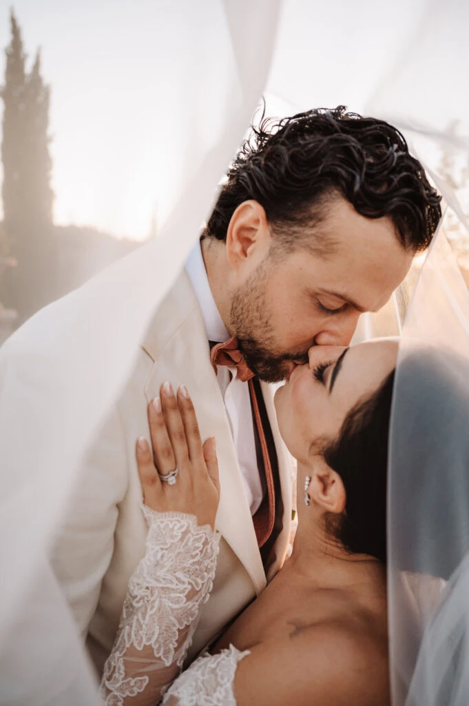 True bride Claudia embracing her husband