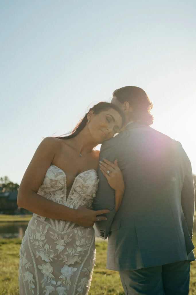 True bride Ashley posing with her husband