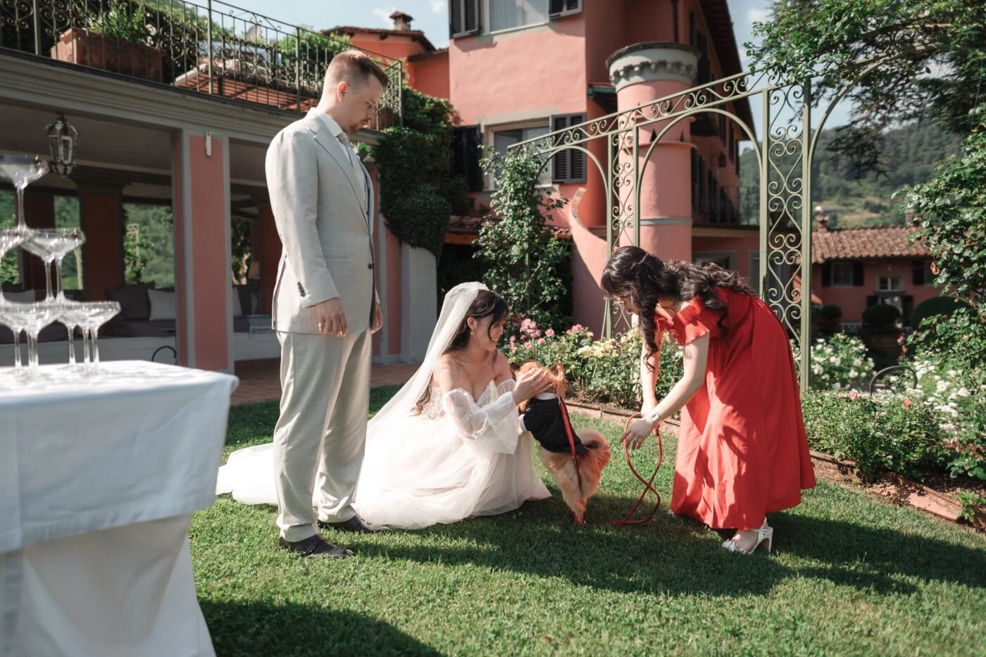 True bride Ngoc playing with dog during her wedding